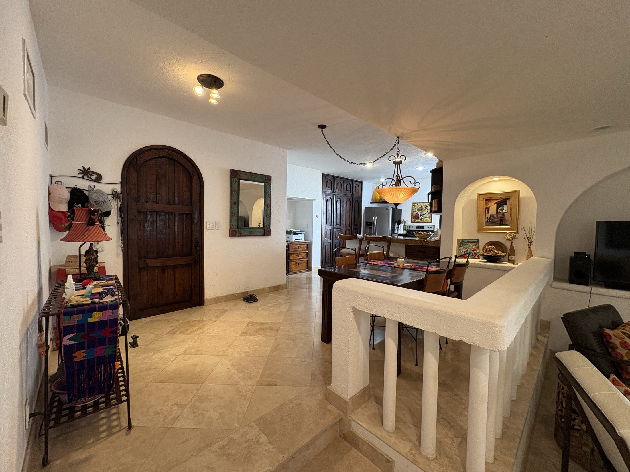 Dining area overlooking the living room and kitchen